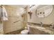Updated bathroom with granite vanity and walk-in shower at 19 Whispering Sands Dr # 1204, Sarasota, FL 34242