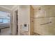 Bathroom with walk-in shower and pebble floor at 19 Whispering Sands Dr # 1204, Sarasota, FL 34242