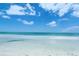 Beautiful beach with clear water and white sand at 19 Whispering Sands Dr # 1204, Sarasota, FL 34242