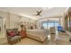 Main bedroom with ocean view and relaxing sitting area at 19 Whispering Sands Dr # 1204, Sarasota, FL 34242