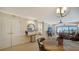 Elegant dining area with access to living room and balcony at 19 Whispering Sands Dr # 1204, Sarasota, FL 34242