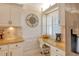 Kitchen features granite countertop and built-in workspace at 19 Whispering Sands Dr # 1204, Sarasota, FL 34242