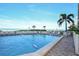 Inviting community pool overlooking the ocean at 19 Whispering Sands Dr # 1204, Sarasota, FL 34242
