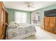 Main bedroom with access to the pool area and a walk-in closet at 2091 Oakford Rd, Sarasota, FL 34240