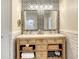 Double vanity bathroom with blue and white tile accents at 2402 Palmetto St, Nokomis, FL 34275