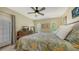 Bright bedroom with a king-size bed and access to a private patio at 2402 Palmetto St, Nokomis, FL 34275