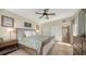 Spacious bedroom with a king-size bed and built-in drawers at 2402 Palmetto St, Nokomis, FL 34275