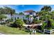 Beautiful house exterior with manicured landscaping and curb appeal at 2402 Palmetto St, Nokomis, FL 34275