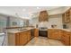 Modern kitchen with stainless steel appliances and white subway tile backsplash at 2402 Palmetto St, Nokomis, FL 34275