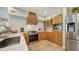 Modern kitchen with stainless steel appliances and white subway tile backsplash at 2402 Palmetto St, Nokomis, FL 34275