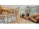 Modern kitchen with wooden countertops and bar seating at 2402 Palmetto St, Nokomis, FL 34275