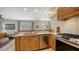 Modern kitchen with stainless steel appliances and white subway tile backsplash at 2402 Palmetto St, Nokomis, FL 34275