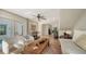 Open living space showcasing comfortable seating and views of the pool at 2402 Palmetto St, Nokomis, FL 34275