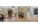 Cozy living room with tiled floors, comfortable seating, and a bar cart at 2402 Palmetto St, Nokomis, FL 34275