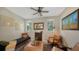 Cozy sitting area with leather chairs and a daybed at 2402 Palmetto St, Nokomis, FL 34275