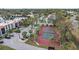 Aerial view showing tennis court and surrounding condo buildings at 3213 Beneva Rd # 201, Sarasota, FL 34232