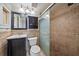Clean bathroom featuring a shower and updated vanity at 3213 Beneva Rd # 201, Sarasota, FL 34232