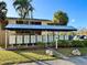 Well-maintained community mailboxes under covered structure at 3433 Clark Rd # 234, Sarasota, FL 34231