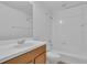 Clean bathroom with a shower/tub combo and wood vanity at 360 Cape Harbour Loop # 105, Bradenton, FL 34212