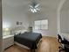 Comfortable guest bedroom with a queen-size bed and a workspace at 3701 54Th W Dr # 104, Bradenton, FL 34210