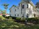 Side view of condo building showcasing building features and landscaping at 3701 54Th W Dr # 104, Bradenton, FL 34210