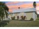 Well-maintained Ranch style home with landscaped yard and sunset view at 5891 Tidewood Ave # 1, Sarasota, FL 34231
