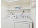 Neat laundry room with washer and dryer at 5891 Tidewood Ave # 1, Sarasota, FL 34231