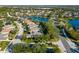 Aerial view of a beautiful community with a lake and upscale homes at 6305 Royal Tern Cir, Lakewood Ranch, FL 34202