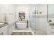 Modern bathroom with soaking tub, walk-in shower, and designer tile at 6305 Royal Tern Cir, Lakewood Ranch, FL 34202