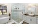 Spa-like bathroom features a soaking tub, walk-in shower, and modern vanity at 6305 Royal Tern Cir, Lakewood Ranch, FL 34202