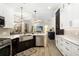 Modern kitchen with stainless steel appliances and custom cabinetry at 6305 Royal Tern Cir, Lakewood Ranch, FL 34202