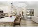 Bright kitchen features a breakfast nook overlooking the pool and patio at 6305 Royal Tern Cir, Lakewood Ranch, FL 34202