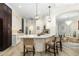 Modern kitchen with white cabinets, a large island, and stainless steel appliances at 6305 Royal Tern Cir, Lakewood Ranch, FL 34202