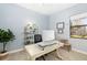 Home office with built-in shelving, a desk, and large window at 6305 Royal Tern Cir, Lakewood Ranch, FL 34202