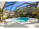 Inviting screened pool and spa with lush landscaping at 6305 Royal Tern Cir, Lakewood Ranch, FL 34202