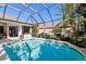 Inviting pool and spa area with a screened enclosure at 6305 Royal Tern Cir, Lakewood Ranch, FL 34202