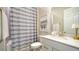 Clean bathroom with a shower/tub combo and updated vanity at 7122 Whittlebury Trl, Bradenton, FL 34202