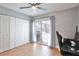 Bedroom with sliding door to backyard at 8224 Country Oaks Ct, Sarasota, FL 34243
