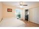 Bedroom with built-in desk and large closet at 8224 Country Oaks Ct, Sarasota, FL 34243