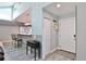 Bright entryway with access to kitchen and coat closet at 8224 Country Oaks Ct, Sarasota, FL 34243