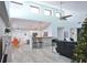 Open concept kitchen with island and breakfast bar at 8224 Country Oaks Ct, Sarasota, FL 34243