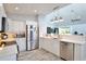 Modern kitchen with stainless steel appliances and white cabinets at 8224 Country Oaks Ct, Sarasota, FL 34243