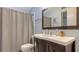 Clean bathroom with dark vanity and updated fixtures at 119 Tidewater Dr # 119, Bradenton, FL 34210