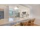 Kitchen boasts white cabinets, quartz counters, and modern appliances at 119 Tidewater Dr # 119, Bradenton, FL 34210