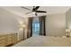 Main bedroom with sliding door to patio and water view at 119 Tidewater Dr # 119, Bradenton, FL 34210