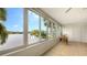 Sunroom with water views and ample natural light at 119 Tidewater Dr # 119, Bradenton, FL 34210