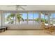 Sunroom with water views and ample natural light at 119 Tidewater Dr # 119, Bradenton, FL 34210
