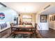 Bright dining room featuring a wood table, bench seating, and tasteful artwork at 1611 Clower Creek Dr # Ha236, Sarasota, FL 34231