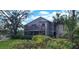 Two-story condo with private balcony, screened porch, and lush landscaping at 1611 Clower Creek Dr # Ha236, Sarasota, FL 34231