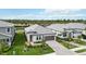 Single-Gathering home with tile roof, driveway, and landscaped front yard at 16714 Savory Mist Cir, Bradenton, FL 34211